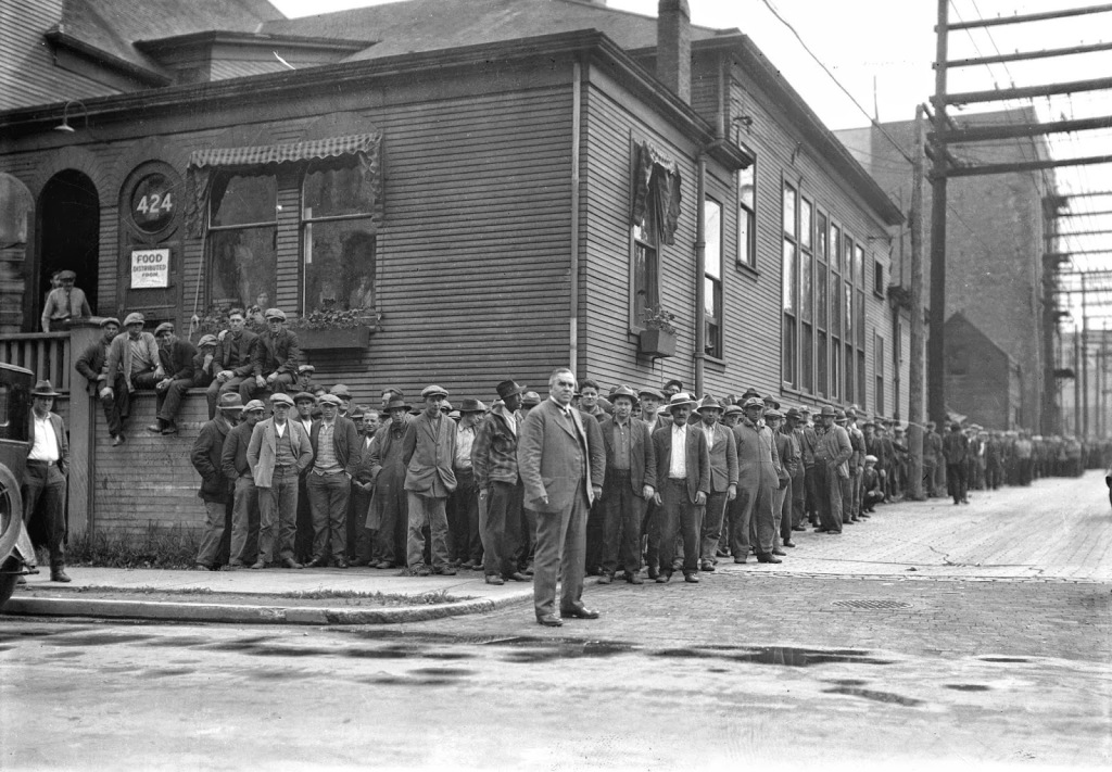 Andrew Roddan getting ready to open-air preach to a line of men waiting to get food at the First United Church in Vancouver